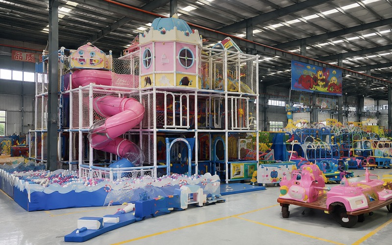 Factory assembled indoor play structures with slides ball pool and ride on play units